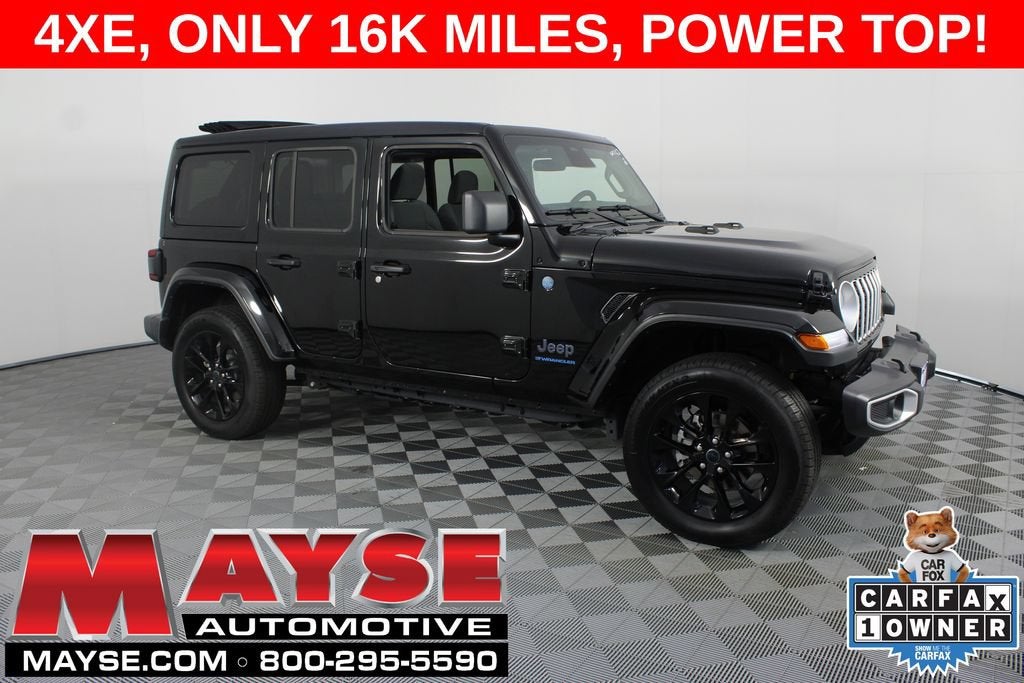 2025 Jeep Wrangler 4xe Sahara in Black/Sahar/4Xe — front three-quarter view