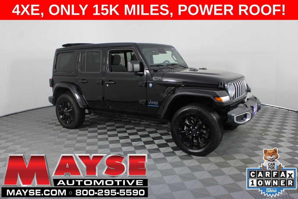 2025 Jeep Wrangler 4xe Sahara in Black/Sahar/4Xe — front three-quarter view