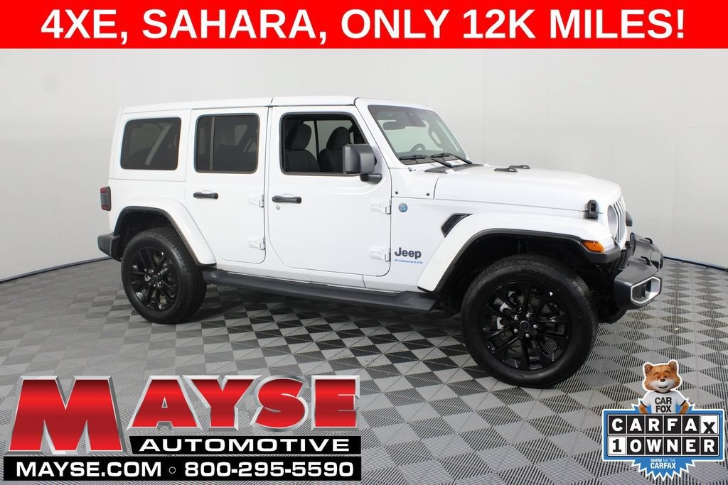 2025 Jeep Wrangler 4xe Sahara in White/Sahar/4Xe — front three-quarter view