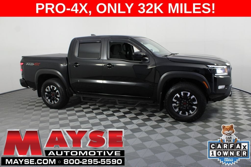 2024 Nissan Frontier PRO-4X in Blk/Pro/Rwd4x4 — front three-quarter view