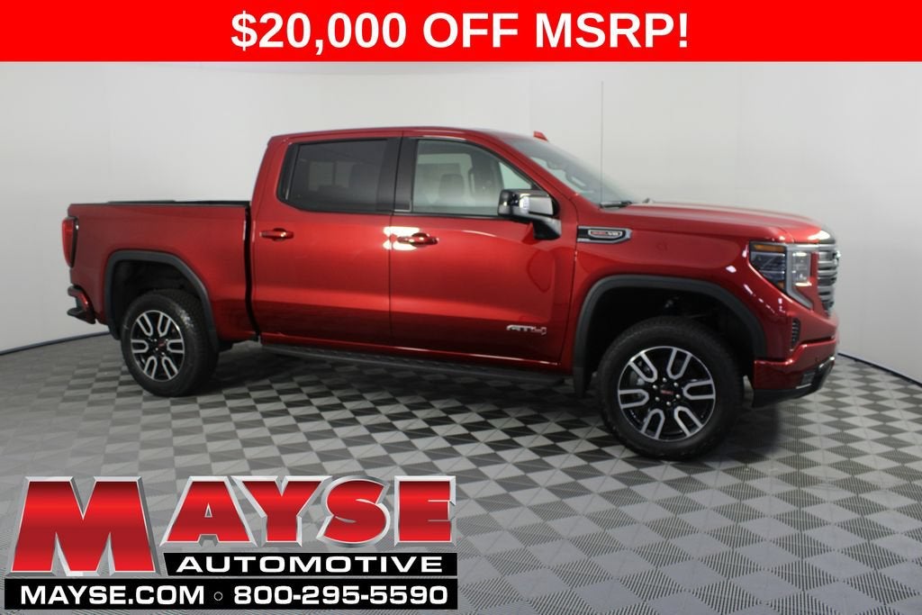 2026 GMC Sierra 1500 AT4 in Volcanic Red Tintcoat — front three-quarter view