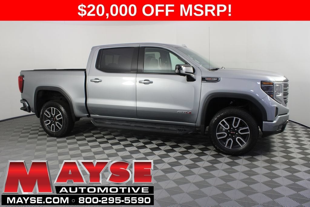 2026 GMC Sierra 1500 AT4 in Sterling Metallic — front three-quarter view