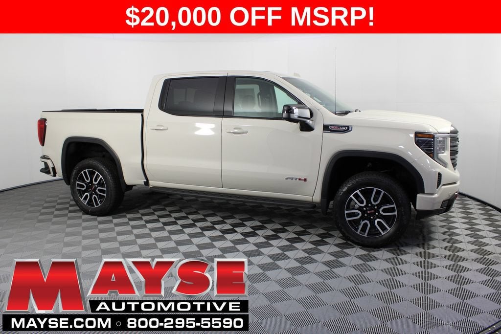 2026 GMC Sierra 1500 AT4 in Coastal Dune — front three-quarter view