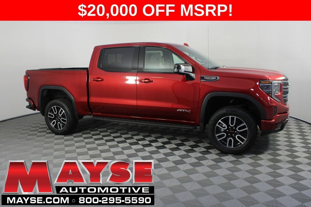 2026 GMC Sierra 1500 AT4 in Volcanic Red Tintcoat — front three-quarter view